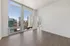 888 at Grand Hope Park Spacious Bedroom Featuring Floor-to-Ceiling Windows with City Views