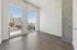 888 at Grand Hope Park Spacious Bedroom Featuring Floor-to-Ceiling Windows with City Views