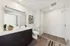 888 at Grand Hope Park Modern Bathroom Featuring a Vanity with Bright Lighting