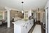 Arrive 800 Penn Modern Open Kitchen with White Cabinety and Stainless Steel Appliances