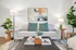 Arrive Rolling Oaks Living Room with Large Couch and Natural Lighting