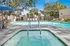Arrive Rolling Oaks Pool Area with Lounge Chairs
