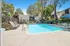 Arrive Rolling Oaks Pool Area with Lounge Chairs