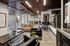 Arrive 800 Penn Modern Lobby with Ample Seating and View of Patio