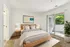 Arrive Crofton Bedroom with Sliding Glass Doors to Patio