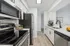 Arrive Crofton Kitchen with White Cabinetry with Stainless Steel Appliances