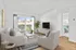 Arrive Santa Clarita Living Room with Sliding Glass Doors to Balcony