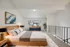 Alturas Vose Townhomes Open Bedroom with Modern Light Fixtures