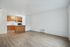 Alturas Vose Townhomes Living Room with Connecting Kitchen