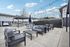 Alturas Vose Townhomes Outdoor Living Space with Ample Seating and Ambient Lighting