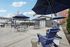 Alturas Vose Townhomes Outdoor Living Space with Ample Seating and Ambient Lighting