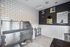 Chic pet spa with a modern stainless steel wash station and artistic decor.