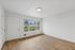 Alturas Cedar Hills Open Living Space with Wide Window Overlooking Garden