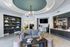 Contemporary lounge with stylish seating, modern decor, and sophisticated lighting.