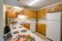 The Social West Ames Kitchen with Brown Cabinets
