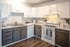 The Social West Ames Kitchen with White and Gray Cabinetry