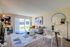The Social West Ames Open Living Room with Balcony