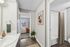 Arrive 800 Penn Apartment Hallway with Modern Finishes and Hardwood Flooring