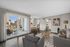 Bright and spacious contemporary living room with a balcony view, modern furniture, and elegant decor.