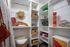Well-organized walk-in closet with shelves, storage baskets, and stylish accessories.
