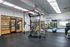 Spacious fitness center with modern gym equipment, perfect for active lifestyles.