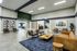 Inviting lobby with stylish seating, modern art, and natural lighting.