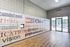 Modern university entryway with motivational wall art and a window view.