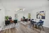 Bright modern office space with stylish furniture and abstract artwork.