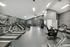 Modern gym with state-of-the-art cardio and weight machines in a stylish setting.