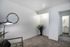 Alturas Eleventh Seating Area with Gray Carpet and Bright Light Fixtures