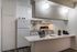 Alturas Eleventh Open Kitchen Area with White Cabinetry and Countertops