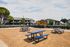 Alturas Eleventh Outdoor Seating Area Furnished with Picnic Tables