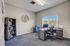 Bright and modern home office with sleek furniture and natural light.