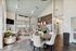 Open-concept community lounge with modern furnishings, stylish decor, and a cozy seating area.