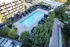 888 at Grand Hope Park Luxurious Pool Featuring Cabanas and Pool Chairs with City Views.