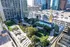 888 at Grand Hope Park Aerial View Featuring Greenery Surrounding the Complex