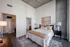 888 at Grand Hope Park Modern Bedroom featuring Spacious Walk-in Closet with En Suite Bathroom.