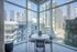 888 at Grand Hope Park Modern Dining Area with Panoramic City Views, Featuring Floor-to-Ceiling Windows
