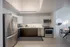 888 at Grand Hope Park Renovated Modern Kitchen with Sleek Cabinetry and Stainless Steel Appliances