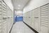 Modern mailroom featuring secure mail lockers with convenient parcel drop-off, showcasing the Arrive West End branding.