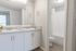 North Water Apartments Modern Bathroom with White Cabinetry and Large Vanity