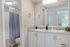 The Social Block Bathroom with White Cabinetry and Large Vanity