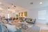 Bright and inviting living room with modern decor, plush sofas, and a spacious open layout perfect for entertaining and relaxation.