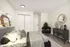 Elegant bedroom with modern decor, featuring a stylish bed, cozy armchair, and chic dresser with decorative items.