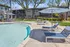 ReNew Berryessa Pool Area with Lounge Chairs and Umbrellas