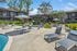 ReNew Berryessa Pool Area with Lounge Chairs and Umbrellas