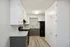ReNew Miramonte Kitchen with White Cabinetry and Sleek White and Gray Cabinetry