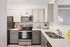 Modern kitchen with sleek stainless steel appliances, white cabinetry, and spacious countertops, perfect for culinary creativity.