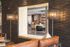Elegant and modern open-plan lounge featuring stylish furnishings, warm lighting, and a cozy ambiance, perfect for relaxation or social gatherings.