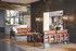 Sophisticated lounge area with elegant leather seating and warm ambient lighting.